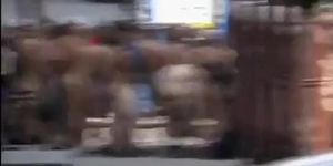 Nudists take a stroll through the city streets