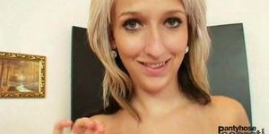 Naughty blonde girl plays with her nylon pantyhose