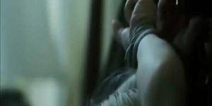 Celeb Maria Bello bare breasts and tied up in bed