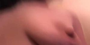 brunette playing with 2 different sizes of dildo 6