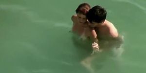 Young Couple On The Nude Beach