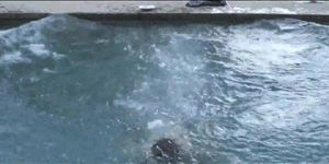 boy and girls play in the pool