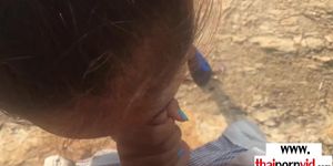Amateur Thai teen Cherry giving a quick blowjob to BF at the beach outdoor