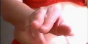 Fingering a woman in front of webcam