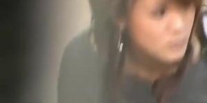 Asian girl gets a Cumshot Sharking on the bus stop.