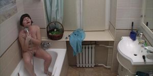 Chick films herself acting nasty in the bathroom