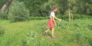 The jogging instructor takes his young student into the woods