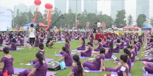 Pregnant Asian women doing yoga (non porn)