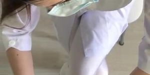 Female doctor examines penis