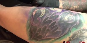 Marie Bossette touches herself while being tattooed (Dagmar Jihlavcova)