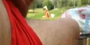Stroking my cock to a bikini girl in the park