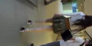 Sexy legs woman in short skirt upskirt