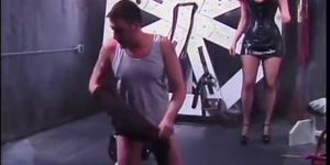 Redheaded femdom ties up her sub