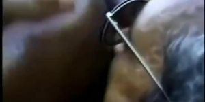 African pregnant chick riding white rod outdoors