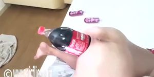 Massive cola bottle is penetrating her hole till she cums