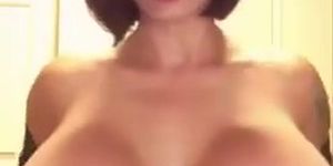 Playing With Her Huge Tits