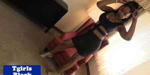 BLACK TGIRLS - Stripteasing black shemale strokes her cock