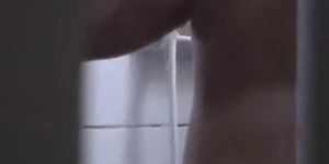 Spying girl on shower