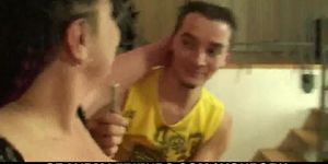 Plump mommy takes two young cocks