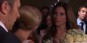 Blonde bride gets her face pushed into the wedding cake