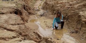 Jodie Bathes in Clay Mud!