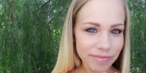 Busty beauty jerking cock outdoors