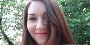 Lusty teen taking a walk outdoor teases her cunt and tits