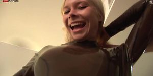 Putting on latex catsuit and fucking