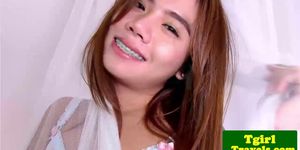 FRANKS T-GIRL WORLD - Oriental shemale in nightgown masturbates