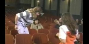 wife with strangers in theater