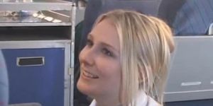 AMWF Stewardess Riley Evans (Nicole Sheridan)