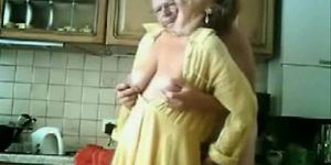 Mum and dad having fun in the kichen. Stolen video