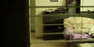window voyeur-girl masturbates