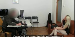 Tanned blonde rides dick in reverse position on couch