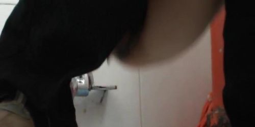 Innocent Asian girl in glasses stars in voyeur pissing video