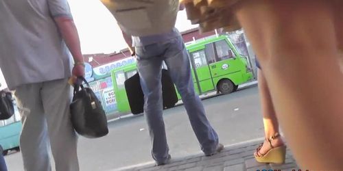 G-string upskirt footage of a redhead on a bus stop
