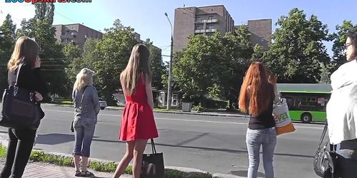 Auburn gal with petite ass in g-string in upskirt vid