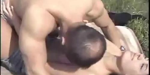 Hot bitch with short hair rides a dick with her ass outdoors