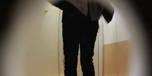 Woman pisses in toilet