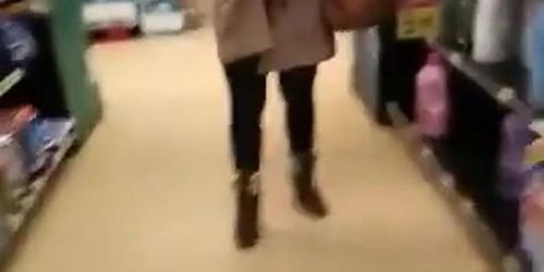 Woman in short dress supermarket upskirt