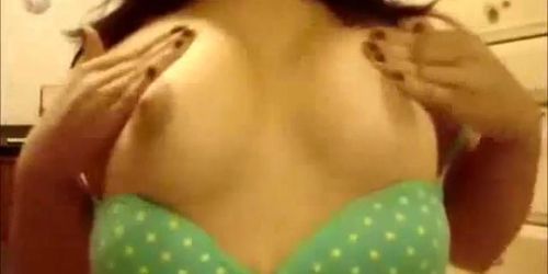 Young teen plays with breasts