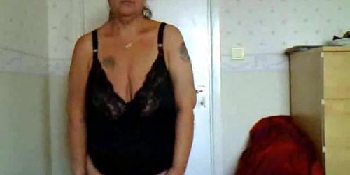 Female amateur stripping in bedroom