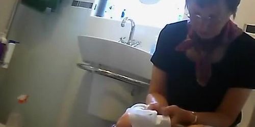 Voyeur spied friends in his toilet