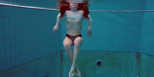 Underwater swimming girl Alice Bulbul