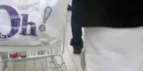 Pierced pussy exposed when she knelt