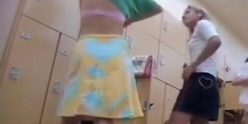 Girl in pink undies taking off the skirt and top with bra