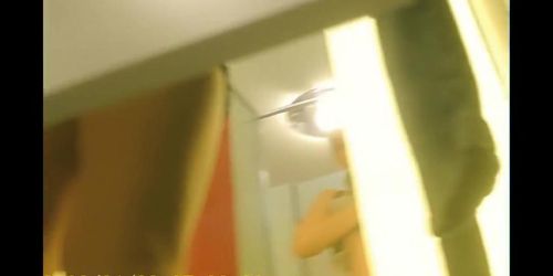 Leggy amateur teen trying on bikini in fitting room