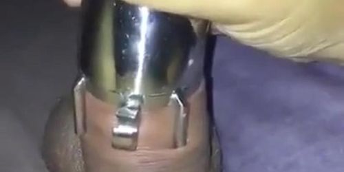 Wife forcing husband’s hard dick into chastity cage