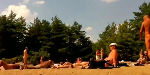 Naked valley at the nudist beach with girls and audlts