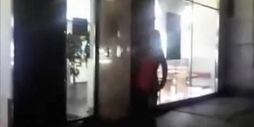 Drunken cutie pissing on a public sidewalk